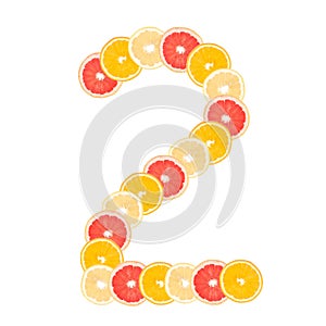 The number `2` made from sliced citrus fruits. Oranges, grapefruit. Isolated on white background