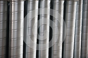 A number of metal ventilation pipes photo