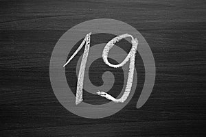 number nineteen enumeration written with a chalk