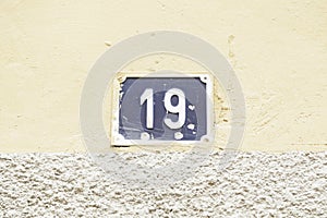 Number nineteen in a wall