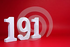 Number One nine One  191  on Red Background with Copy Space - Police emergency call number Concept