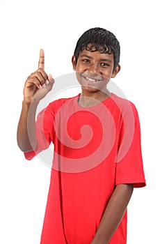 Number one signal from young smiling teenager boy