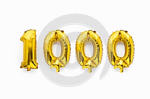 Number 1000 one thousand golden foil balloon party decor on white background, birthday anniversary