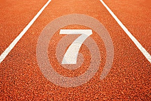 Number seven on running track photo
