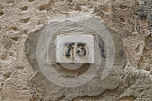 Number seventy three on a wall