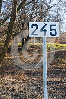 Number 245 sign