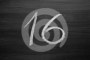 number sixteen enumeration written with a chalk