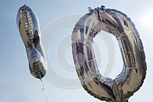 Number ten silver balloons