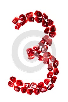 The number three pomegranate seeds isolated on white background.