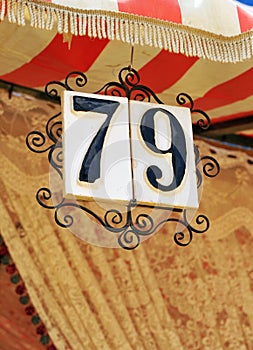 Number of tile, stand in the April Fair, Seville, Andalusia, Spain photo