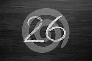 Number twenty six enumeration written with a chalk
