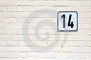 Number 14 on a wall photo