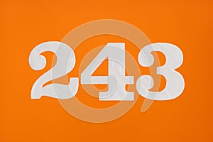 Number 243 - White digits on orange background