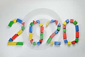 Number of the year 2020 with colorful toy wooden blocks
