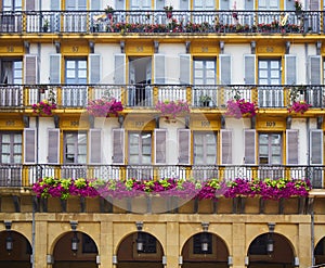 Numbered balconies of The Constitution square Plaza de la Constitucion. San Sebastian, Basque Country, Guipuzcoa. Spain photo