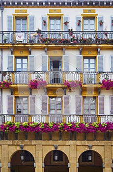 Numbered balconies of The Constitution square Plaza de la Constitucion. San Sebastian, Basque Country, Guipuzcoa. Spain photo