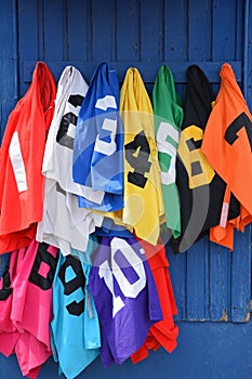 Numbered color coded groom thoroughbred horse racing bibs