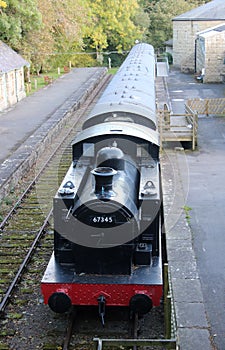 Cosmetically restored steam train Hawes station