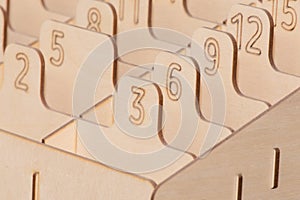 Numbered Sections Figures for Storage of Objects and Parts Made of OSB Material Signs and Symbols Close-up Detail Macro