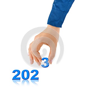 Numbers 2023 and hand