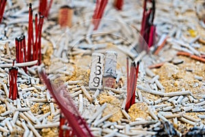 The numbers on the incense sticks dotted on the incense burner It is a gamble that Thai people have played for a long time