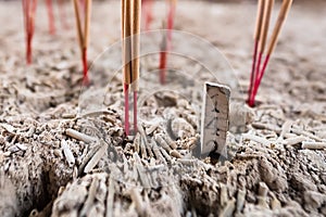 The numbers on the incense sticks dotted on the incense burner It is a gamble that Thai people have played for a long time