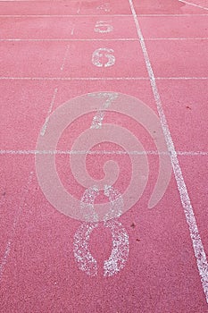 Numbers at starting line and running track