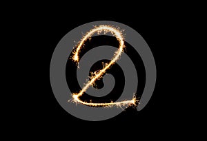 Numbers 2 or two Sparkler firework light isolated on black background