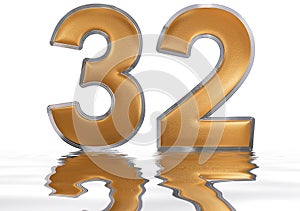 Numeral 32, thirty two, reflected on the water surface,