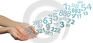 Numerology Concept with random numbers flowing from cupped hands