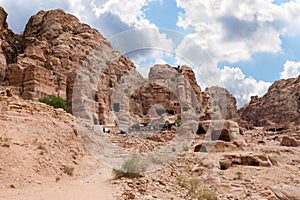 Numerous man made caves carved into rocks in Nabatean Kingdom of Petra in the Wadi Musa city in Jordan