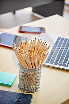 Numerous pencils that have been sharpened