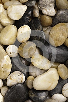 Numerous types of worn river rock