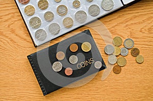 Numismatic albums with coins photo