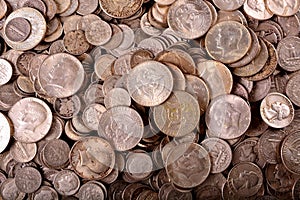 Numismatic background of circulated old silver dimes quarters and half dollars