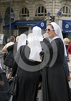 A nun with a camera