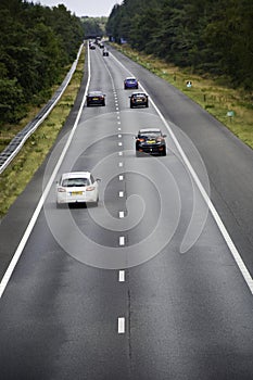 Nunspeet, the Netherlands, August 04, 2019: Cars pass by on the highway