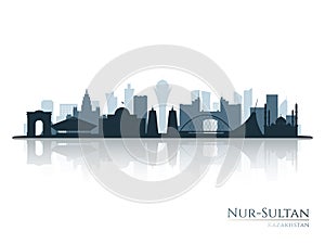 Nur-Sultan skyline silhouette with reflection.