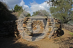 Nuraghic stone house at Su Tempiesu close to Orune on Sardinia photo