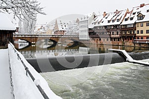 Nuremberg, Germany- Max bridge- river Pegnitz- snowy cityscape photo