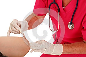 Nurse Applying Bandage photo