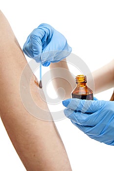 Nurse applying iodine