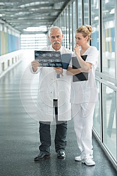 Nurse asking doctor about radiology result