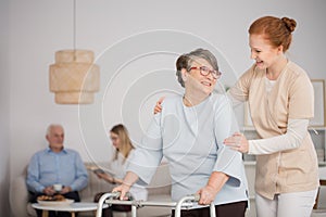 Nurse assisting senior