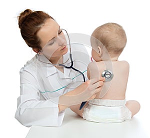 Nurse auscultating child baby patient spine with stethoscope