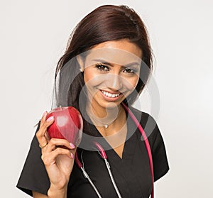 Nurse care giver holding apple