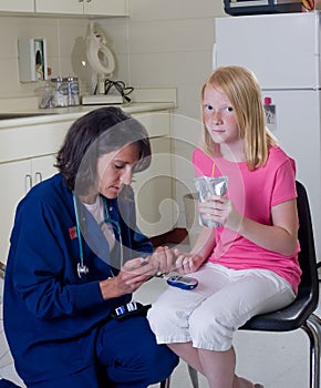 Nurse checking diabetic patient photo