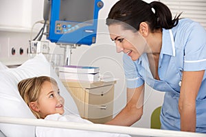 Nurse with child patient in UK A&E photo