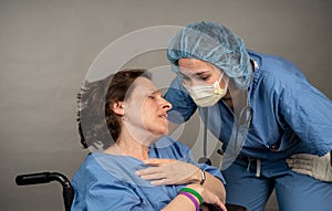 Nurse comforts an exhausted coleage