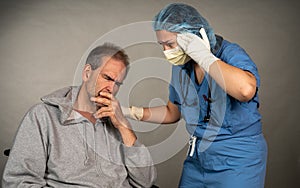 Nurse comforts a sick older man